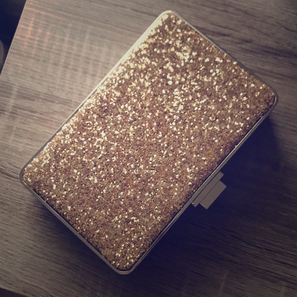 Henri Bendel gold clutch